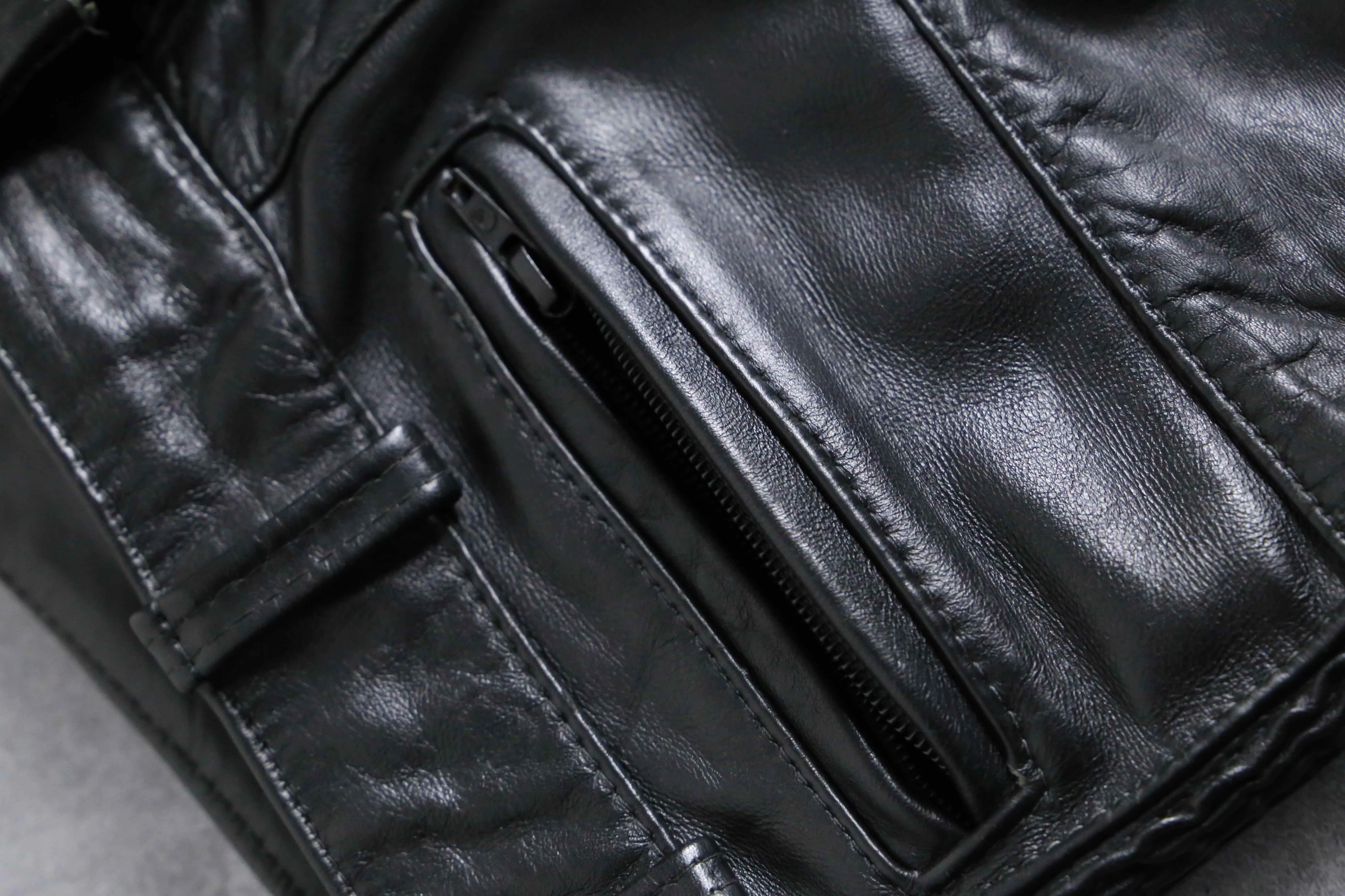 side gather zip leather pants